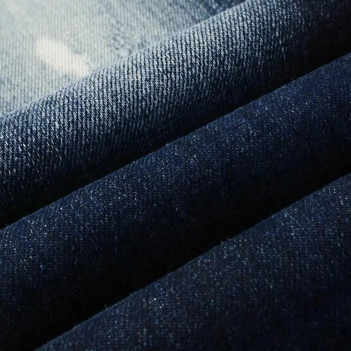 Dark-wash men's grunge jeans